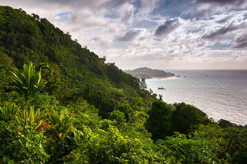 Jungle, mountains and the coast as seen from Bunlap, Vanuatu. Bunlap is an isolated kastom (custom) village in the South-East of Pentecost Island. - obrazy, fototapety, plakaty