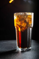 glass of cola with ice