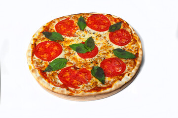 Pizza Margherita with mozzarella, tomatoes and basil leaves