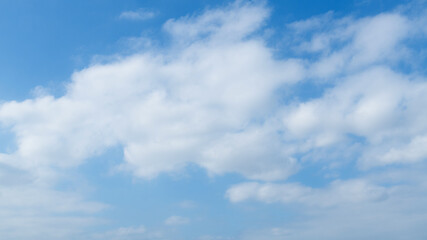Fototapeta na wymiar Blue sky with big white clouds