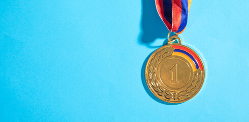 Medal awards for winner on the blue background.
