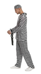 Prisoner in striped uniform with chained hands on white background