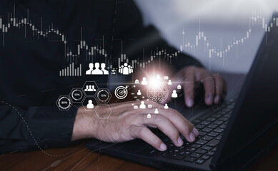 businessman hand type on laptop for work with colleagues partner explain with virtual dashboard statistic chart stock infographic , business technology and work from home with effective concept