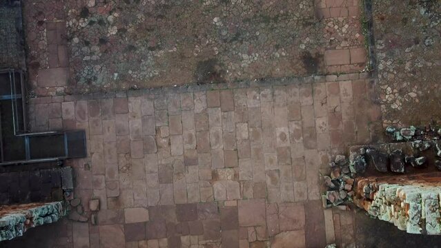 Detailed view of the floor of the church at the San Ignacio Jesuit mission ruins in Northern Argentina Aerial video