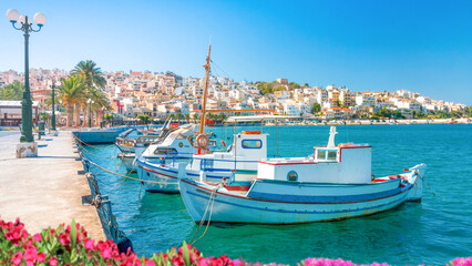 Fototapeta na wymiar Sitia, Crete, Greece; October 4, 2022 - Fishing boats moored at the harbour, Sitia, Crete, Greece.
