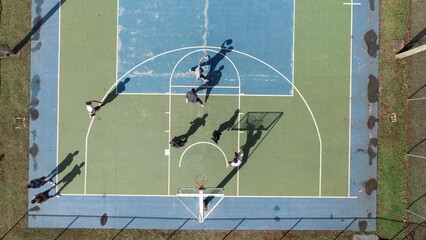 People playing basketball from above