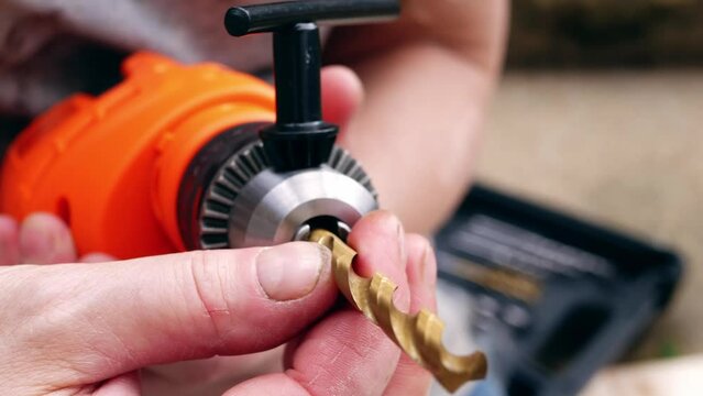 Fitting bit in electric power drill for diy 