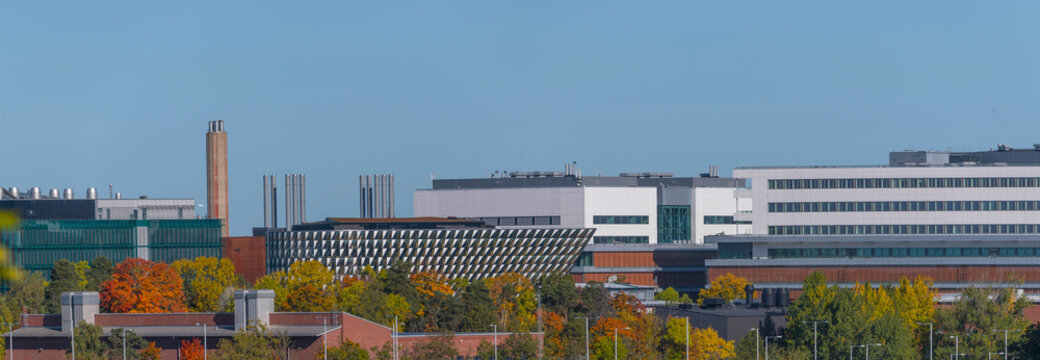 Panorama view of modern buildings in the Solna medical district Karolinska a colorful sunny autumn day in Stockholm

