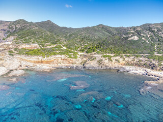 Aerial view of blue sea and rocky coast in Sardinia