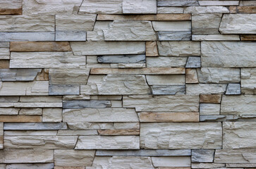 Abstract background of gray and brown bricks.