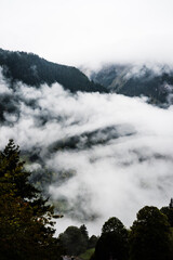Obraz na płótnie Canvas Cloudy mountain views in Wengen Switzerland. 