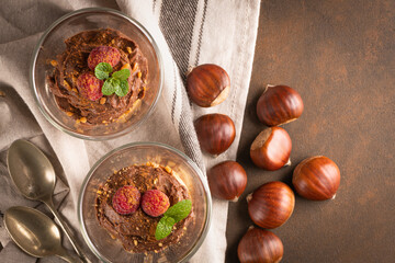 Glass cups of chocolate and chestnuts mousse