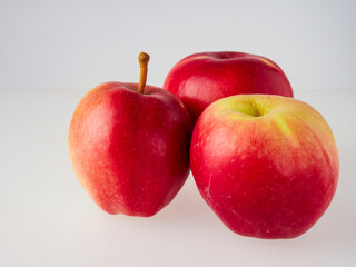 Fresh red apple on white background