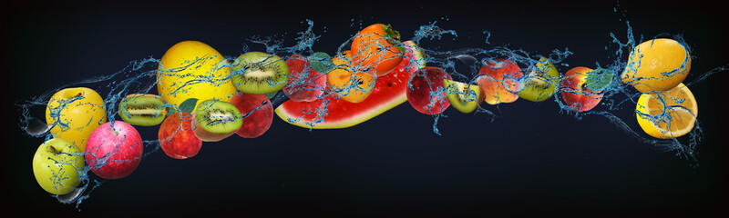 Panorama with fresh fruits in the water - grapefruit, melon, watermelon, lemon, kiwi, peach, apple...