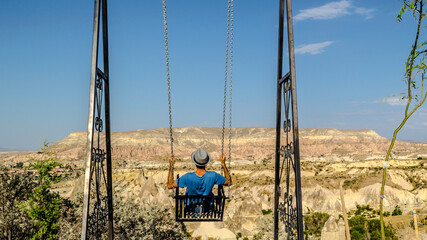 child on a swing