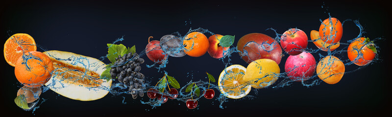 Panorama with fresh fruits in the water - melon, kiwi, lemon, lime, cherry, pear, plum, orange,...