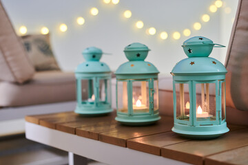 Lamps on a table in a chill-out terrace
