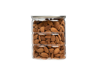 Transparent jar full of almonds on a white background.