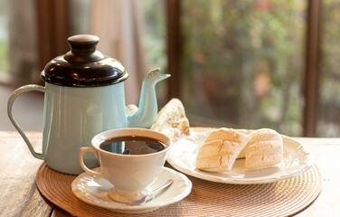 traditional brazilian coffee with homemade cookies crackers and teapot