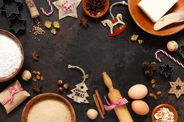 Ingredients for baking traditional Christmas cookies in eco-friendly bamboo dishes and Christmas decor made of wood and bamboo.