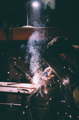 welder welding steel