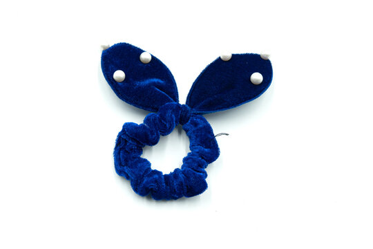 Blue hair scrunchie isolated on white background.