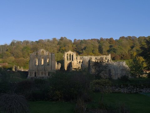 Rievaulx Abbey ree-VOH was a Cistercian abbey in Rievaulx, near Helmsley, in the North York Moors National Park, North Yorkshire, England.