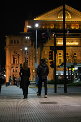 people walking at night in Buenos Aires, Argentina