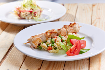 chicken kebab with fresh salad