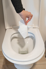 Throwing Garbage in Toilet, Hands Throw Wipes, Toilet Blockage