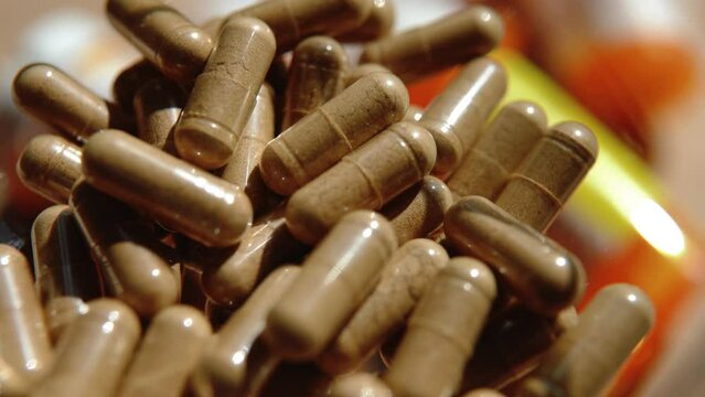 Tablets, capsules, antibiotics. Disease prevention. Treatment for colds and flu. Coronavirus. Receptor drugs. White and green pills.