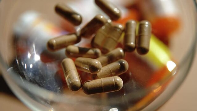 Tablets, capsules, antibiotics. Disease prevention. Treatment for colds and flu. Coronavirus. Receptor drugs. White and green pills.