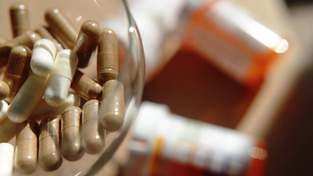 Tablets, capsules, antibiotics. Disease prevention. Treatment for colds and flu. Coronavirus. Receptor drugs. White and green pills.