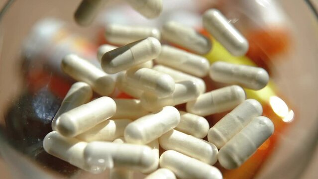 Tablets, capsules, antibiotics. Disease prevention. Treatment for colds and flu. Coronavirus. Receptor drugs. White and green pills.