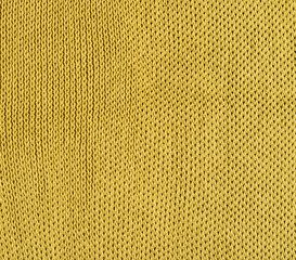 Warm cozy green knitwear closeup, texture background. Minimalism, copy space place for text