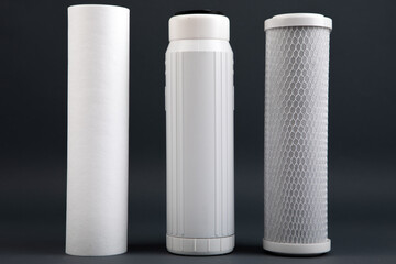 filter cartridges for water on a bright blue background.