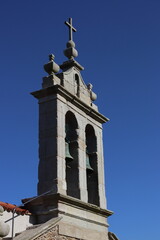 Double stone bell tower of the Hermitage of San Adrián, in Malpica (La Coruña, Spain). portrait...