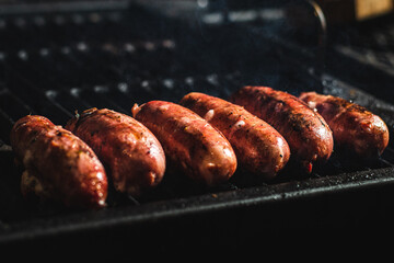grilled chorizos sausages on the grill