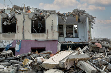 destroyed and burned houses in the city during the war in Ukraine