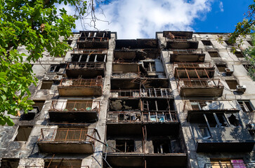 destroyed and burned houses in the city during the war in Ukraine