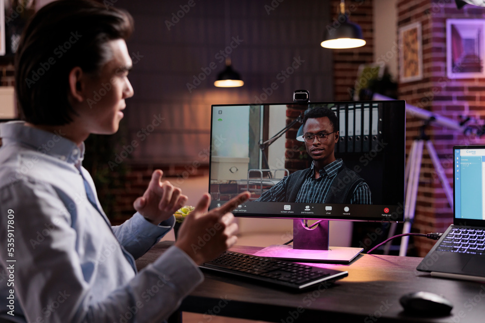 Poster office worker talking to manager on videocall, using webcam on computer and attending online busines
