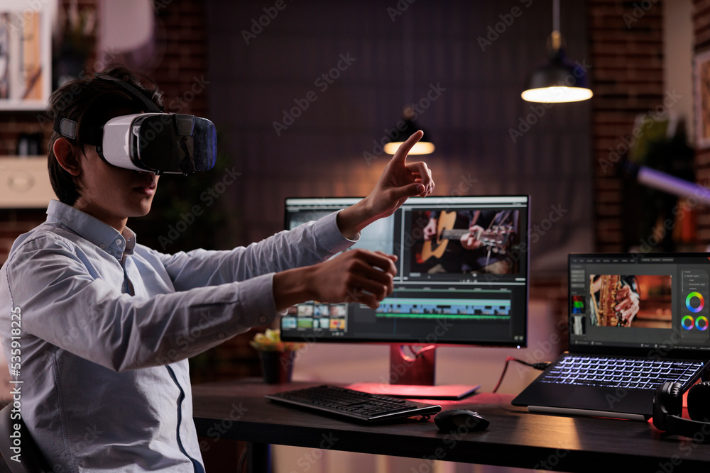 Aufkleber freelancer using vr glasses to edit movie footage with computer software app. videographer editing f