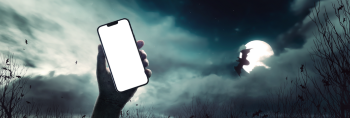 zombie hand holding a mobile phone on Halloween night - transparent PNG