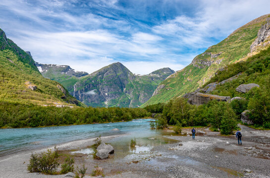 Briksdalen valley, part of the Jostedal Glacier National Park in Norway. The valley was formed by the Briksdal Glacier. Magnificent Norgegian landscape of smooth rock covered in lush vegetation.