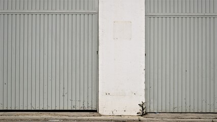 Obraz na płótnie Canvas industrial metal doors as a background