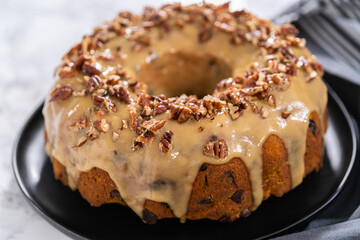 Chocolate pumpkin bundt cake with toffee glaze