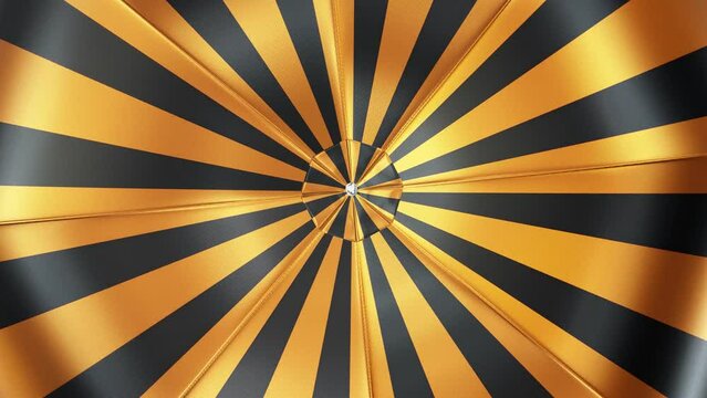 Realistic looping 3D animation of the spinning striped black and yellow umbrella or parasol rendered in UHD as motion background