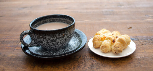 Hot chocolat and bread.