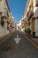 Fototapeta na wymiar Narrow streets in the center of Estepona, typical Andalusian town in southern Spain
