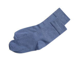 Pair of blue socks on white background, top view